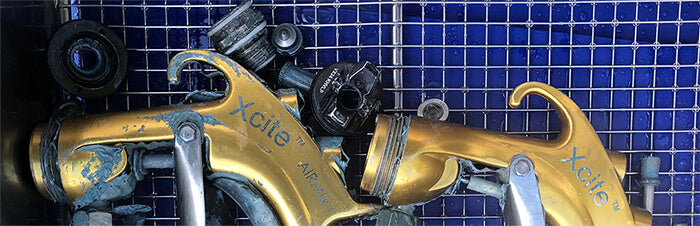 Sprayfish Non-OEM Kremlin® Xcite® Guns Being Cleaned in Ultrasonic Tank